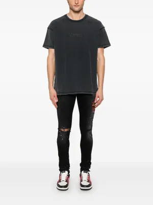 AMIRI - Jean skinny vintage à motifs pour homme