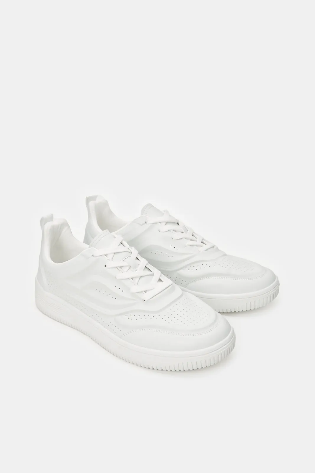 Baskets blanches à bloc de matière pour hommes