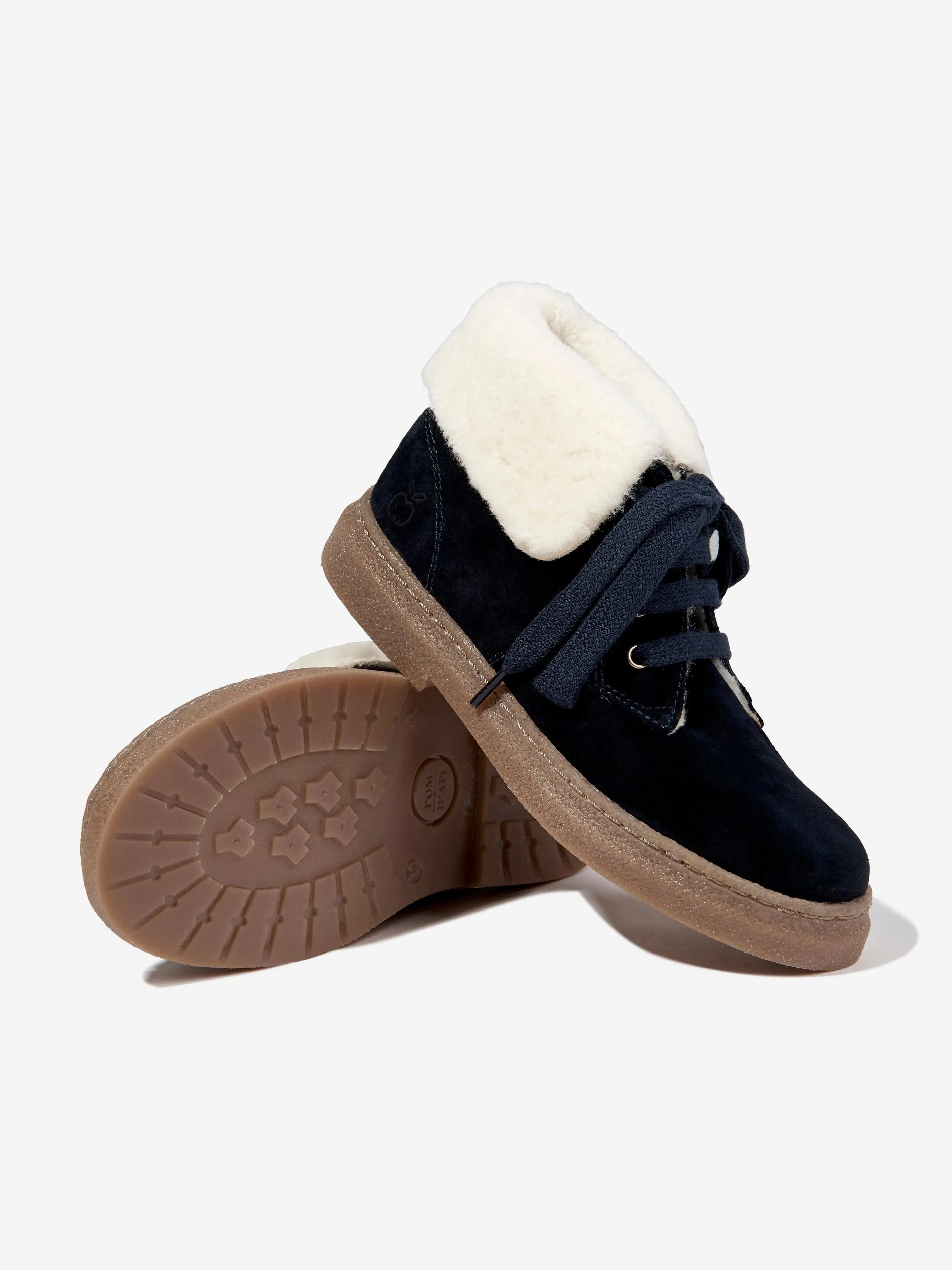 Bottes en fourrure Trix en peau de mouton Pom D'Api Kids en bleu marine