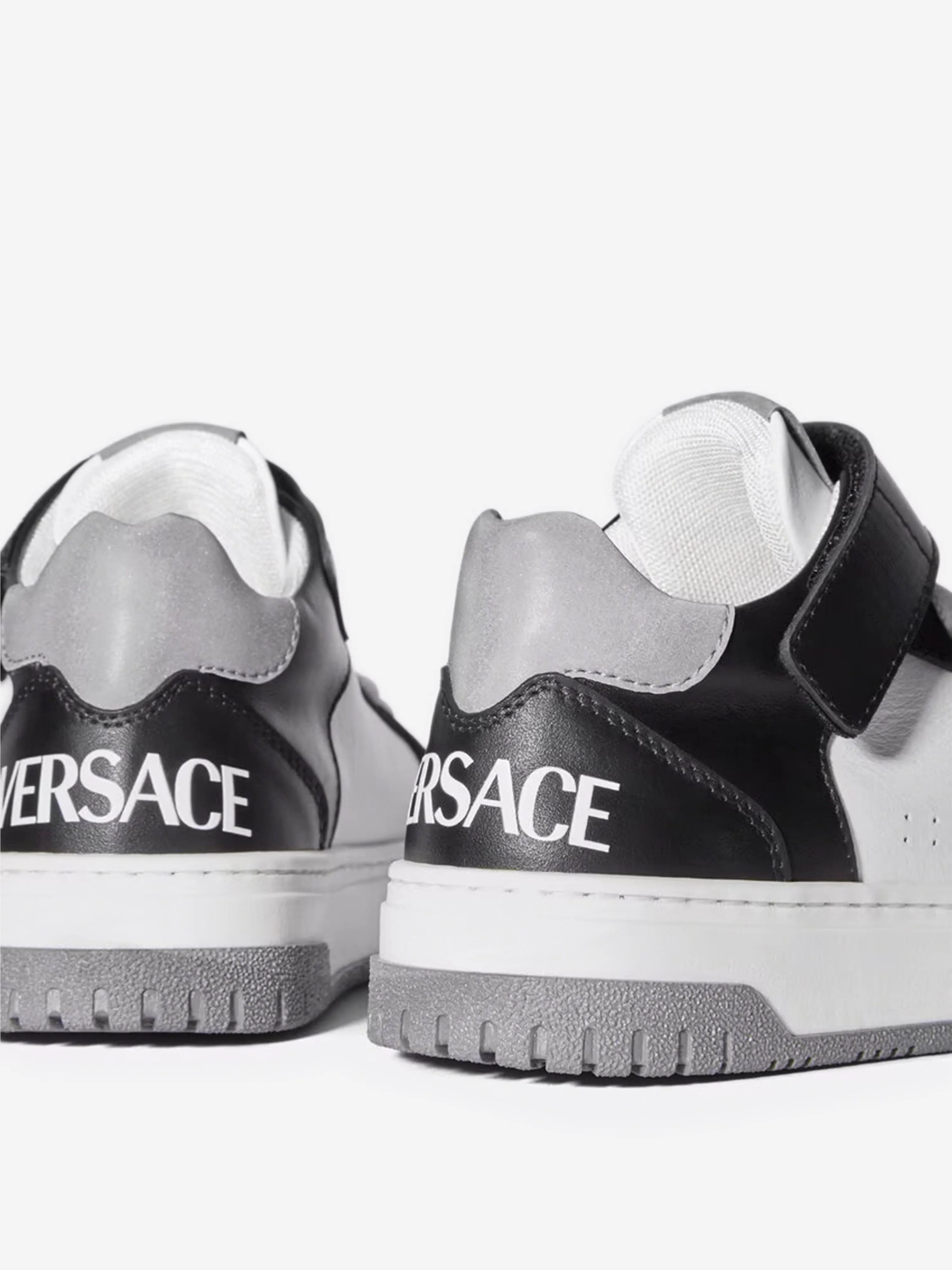Baskets basses en cuir Versace Kids en blanc
